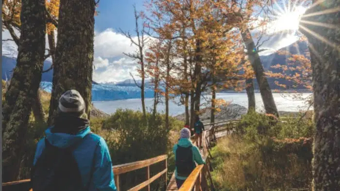 Adventure tourists walking on the glacier